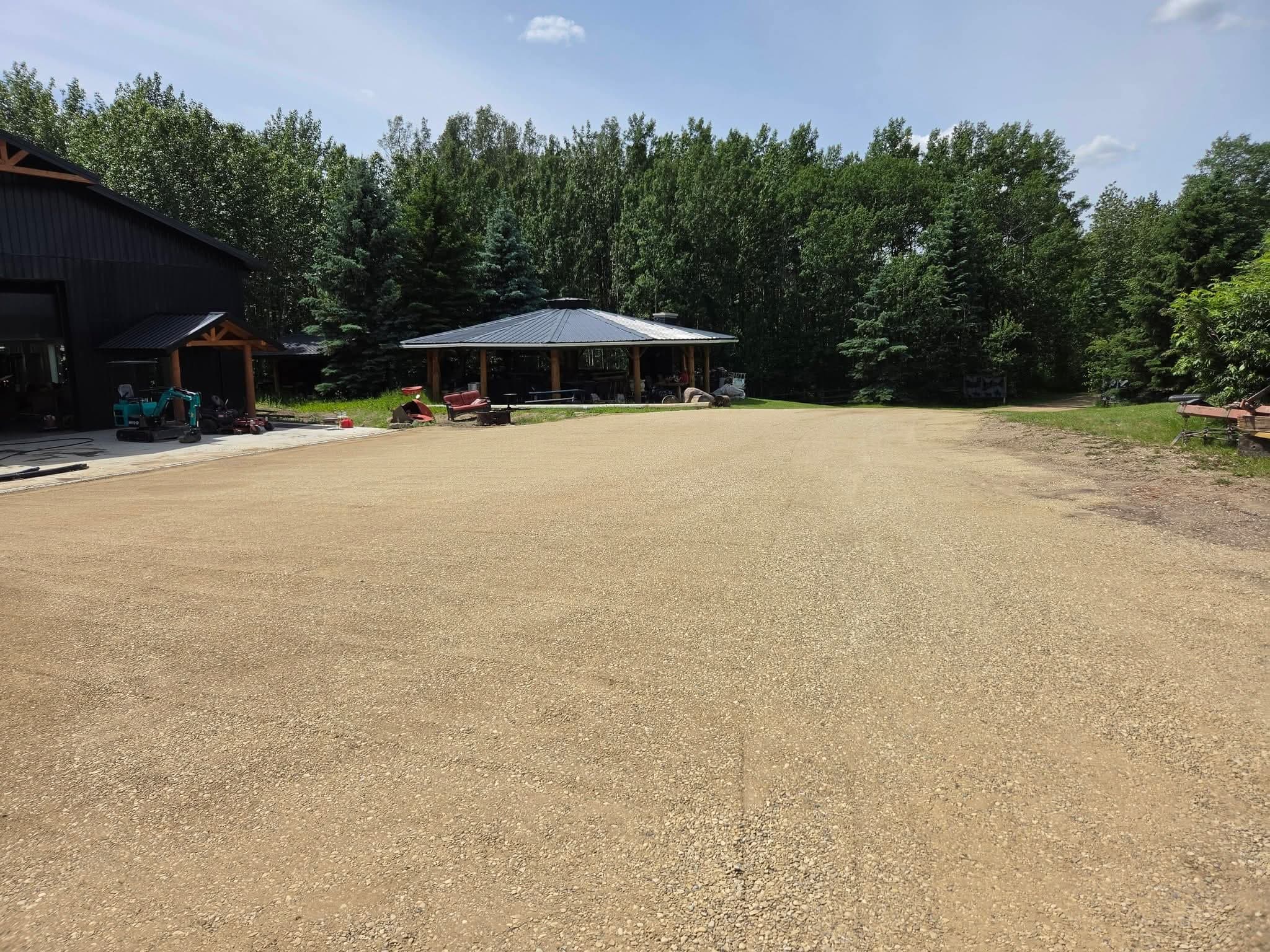 The same yard finished with compacted gravel